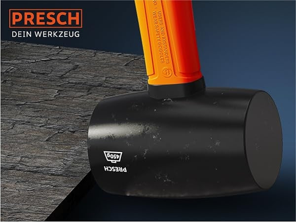 PRESCH Gummihammer in Schwarz mit orangem Griff auf Holzuntergrund, Schonhammer, Ausbeulhammer