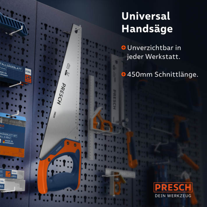 PRESCH Fuchsschwanz, hochwertige Universal Handsäge an einer Werkzeugwand, mit zusätzlichen Sägeblättern und 450mm Schnittlänge.