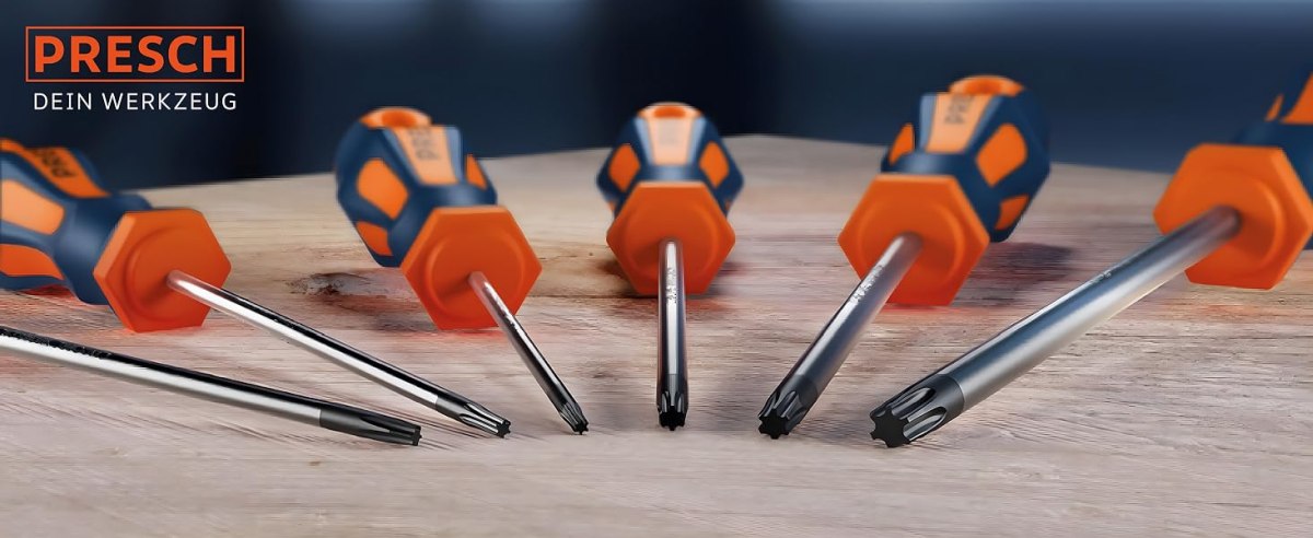 PRESCH Schraubendreher Set auf Holzoberfläche mit verschiedenen Schraubenzieher-Typen und markantem orangen Griff.
